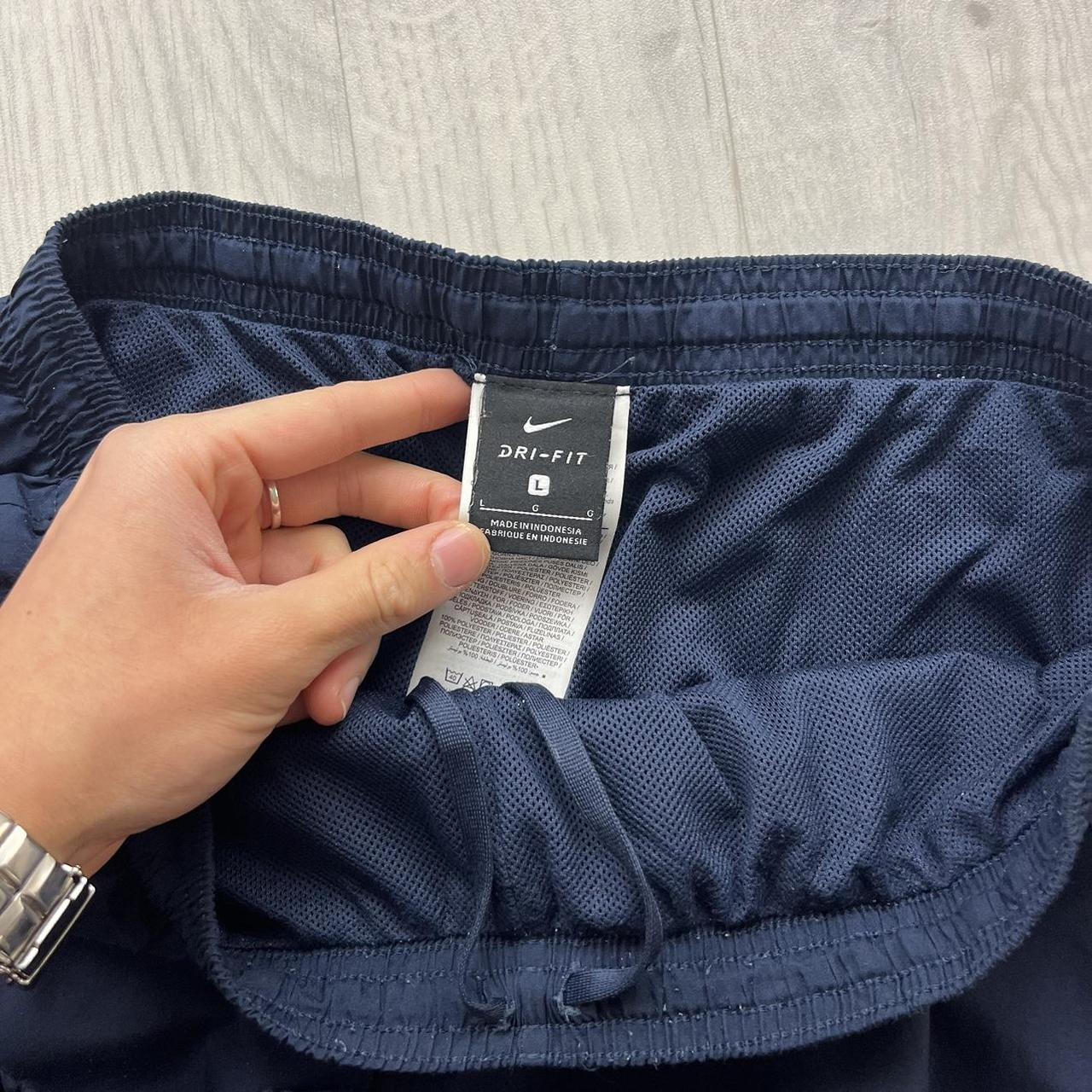NIKE DRI FIT BAGGY TRACKSUIT BOTTOMS NAVY