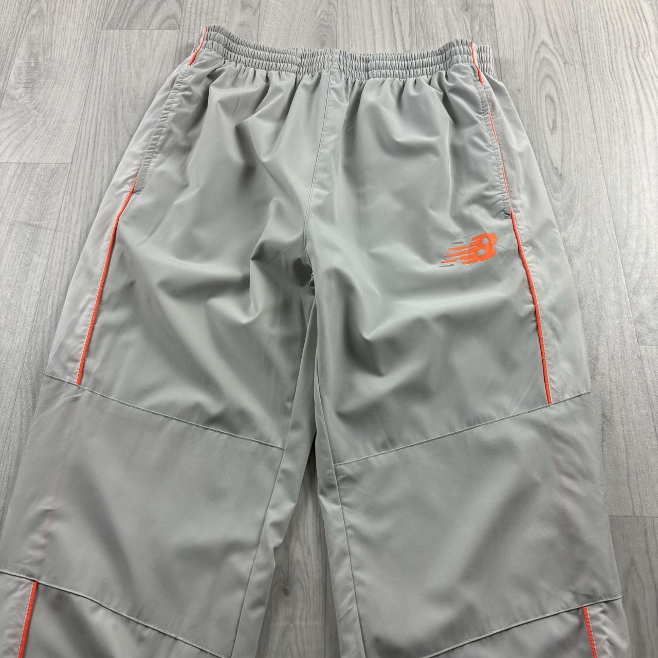 NEW BALANCE BAGGY TRACKSUIT BOTTOMS GREY / WHITE