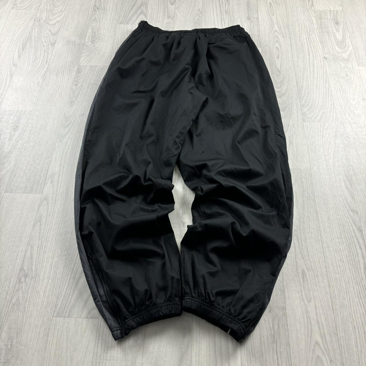VINTAGE 00s REEBOK BAGGY TRACKSUIT BOTTOMS BLACK
