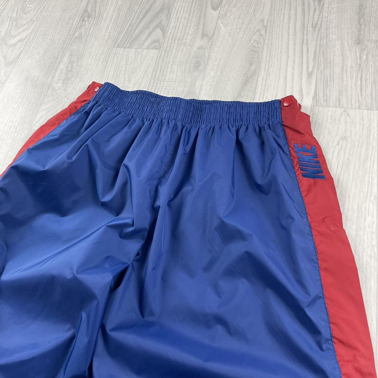 VINTAGE 90s NIKE WIDE LEG TRACKSUIT BOTTOMS BLUE / RED (XXL)