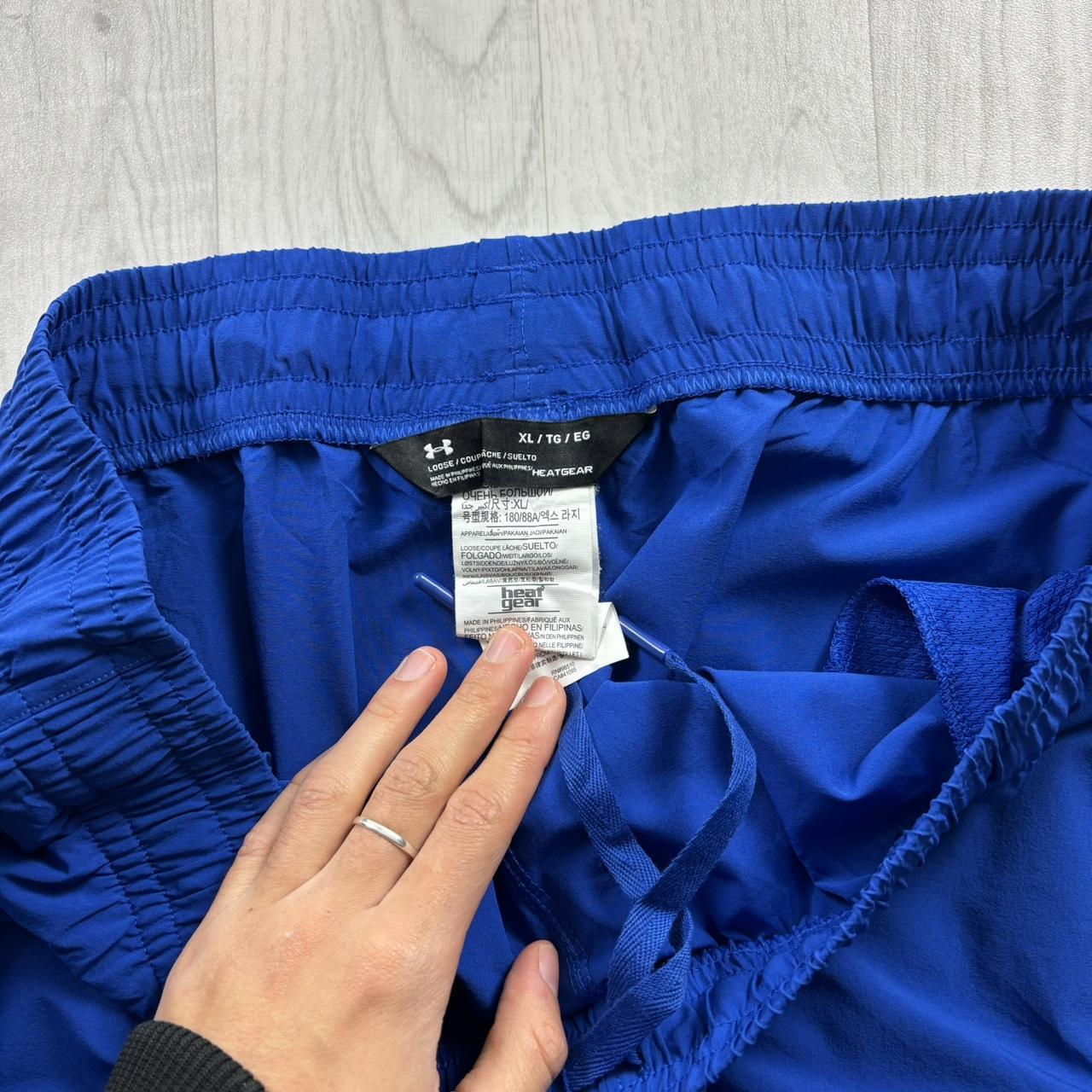 UNDER ARMOUR BAGGY TRACKSUIT BOTTOMS BLUE