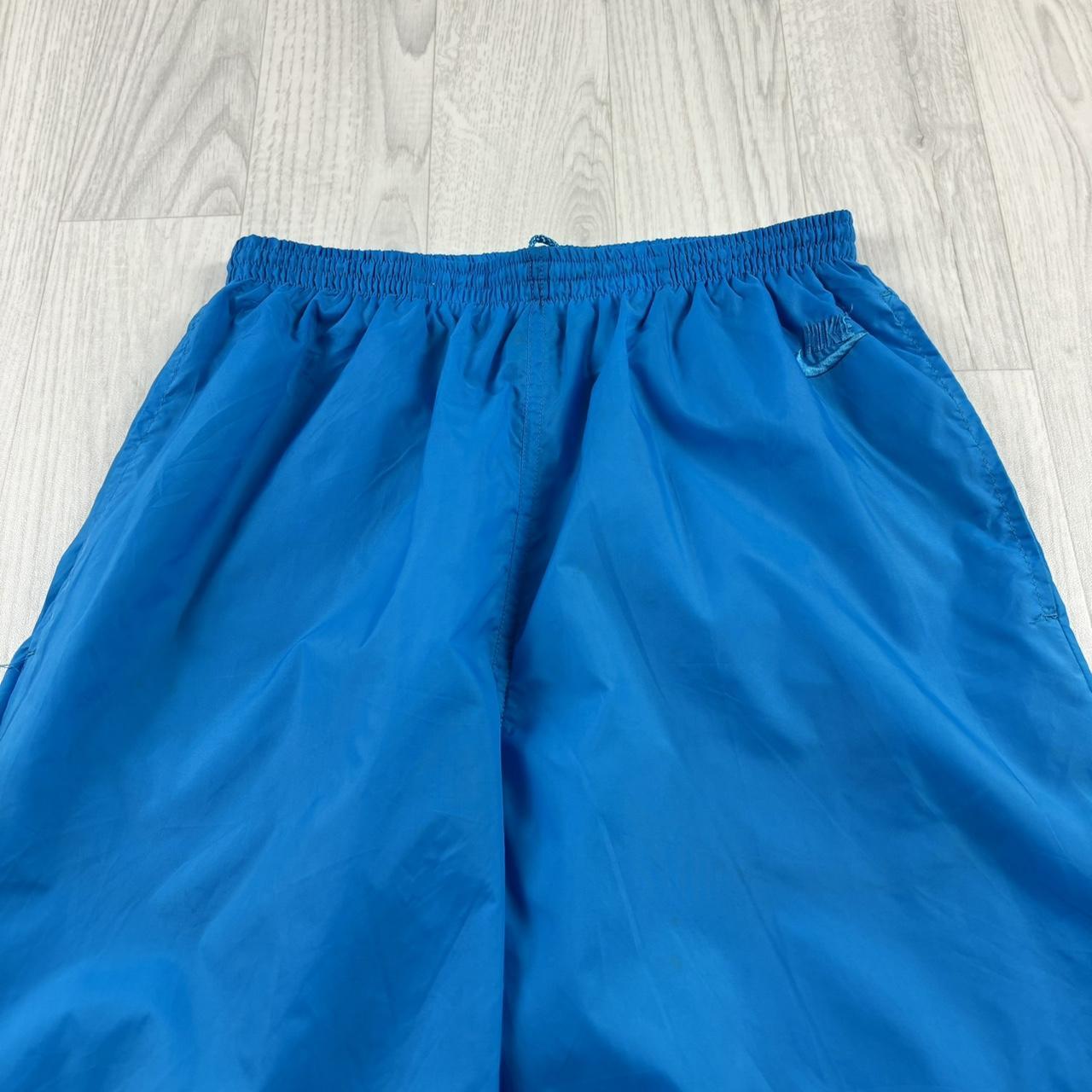 VINTAGE 90s NIKE BAGGY SHELL TRACKSUIT BOTTOMS BLUE
