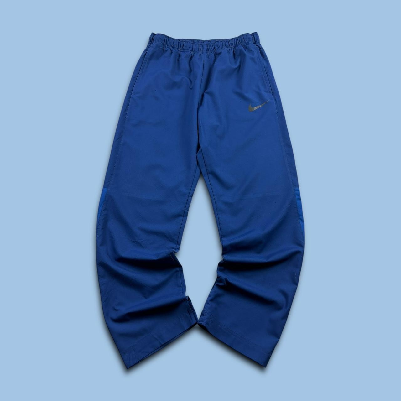 NIKE DRI FIT BAGGY TRACKSUIT BOTTOMS BLUE