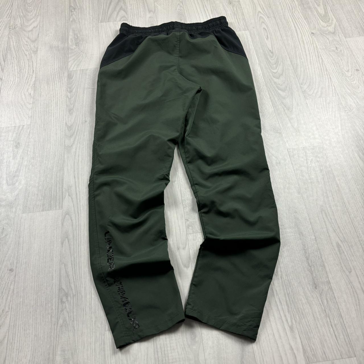 UNDER ARMOUR BAGGY TRACKSUIT BOTTOMS GREEN