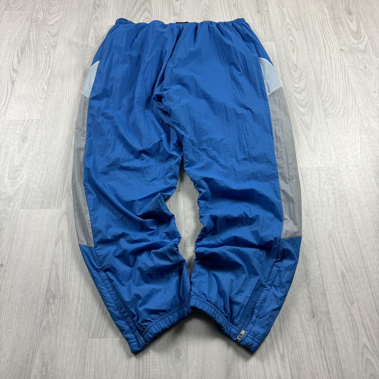 NIKE STRAIGHT LEG BAGGY TRACKSUIT BOTTOMS BLUE
