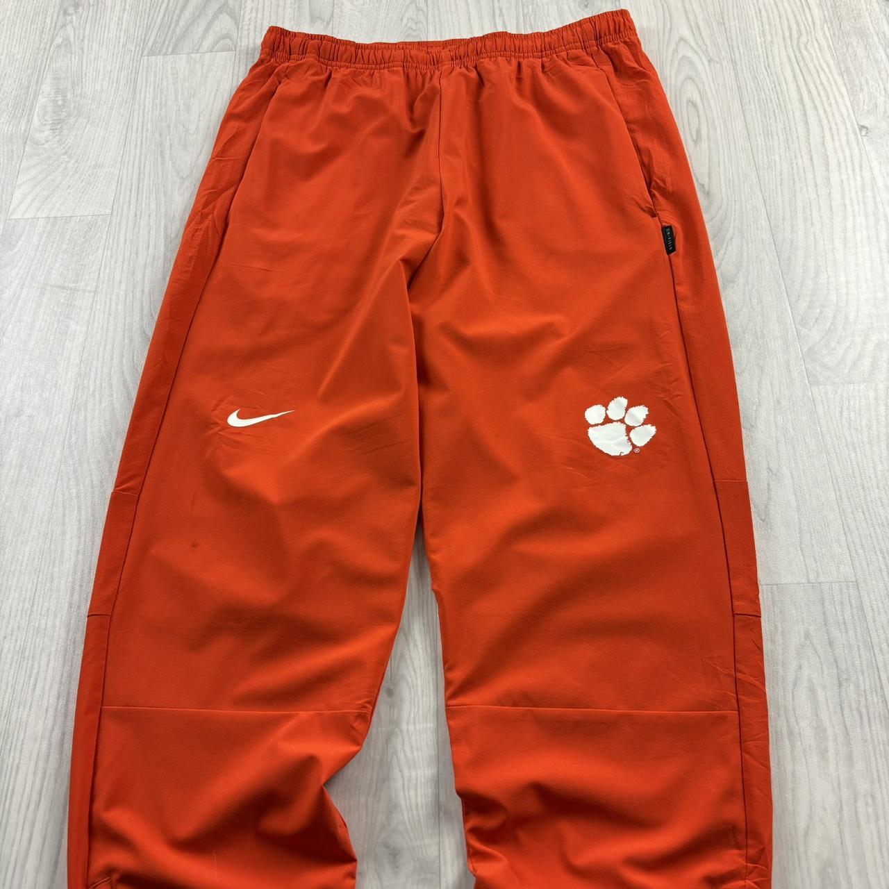 NIKE TEAM BAGGY TRACKSUIT BOTTOMS ORANGE