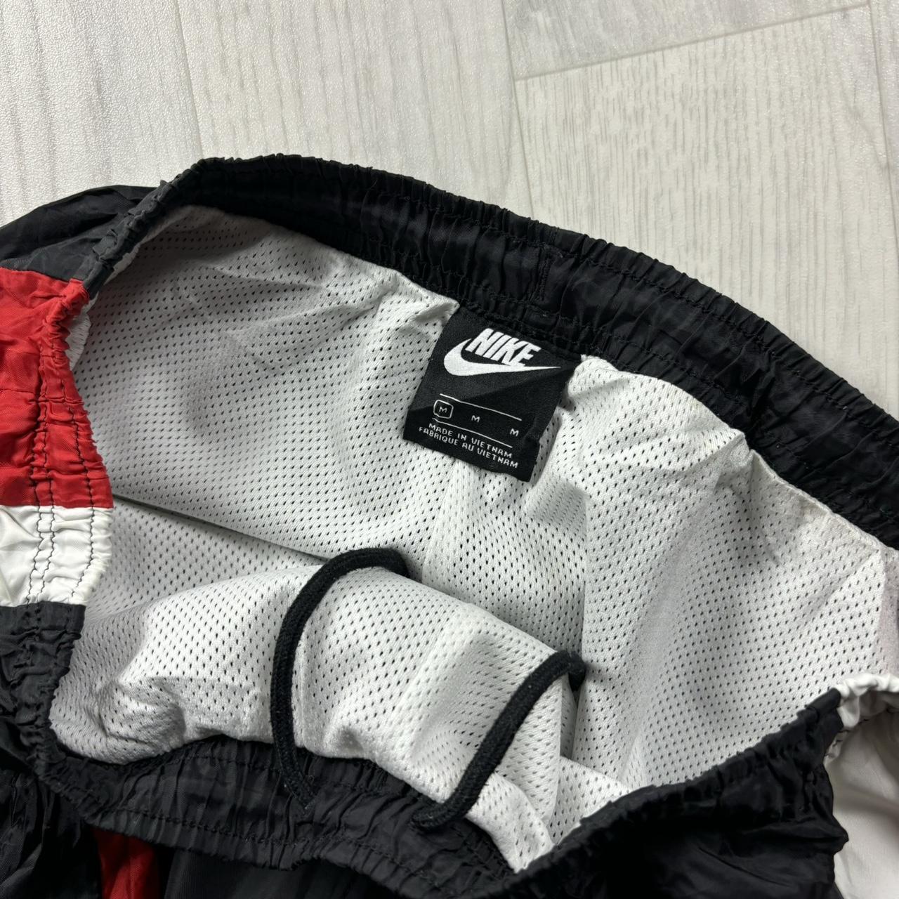 NIKE BAGGY TRACKSUIT BOTTOMS BLACK