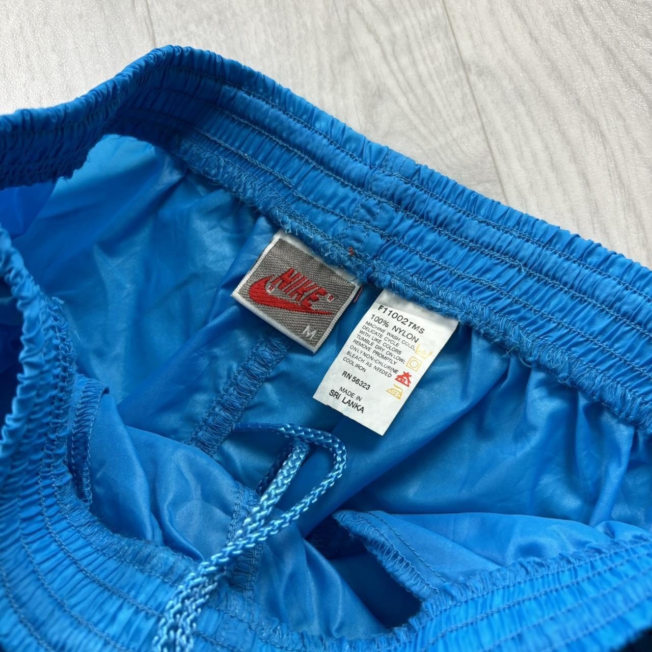 VINTAGE 90s NIKE BAGGY SHELL TRACKSUIT BOTTOMS BLUE