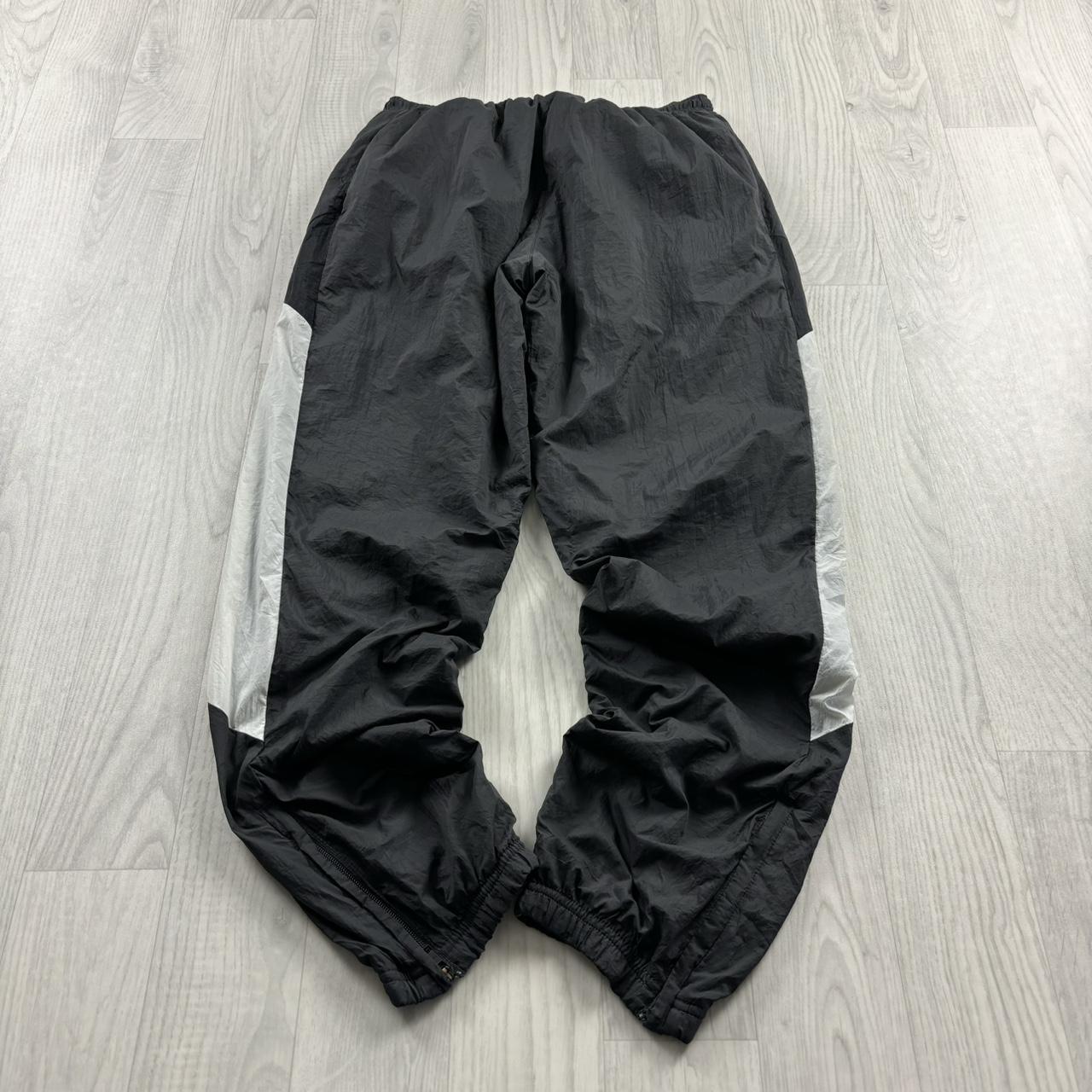 NIKE BAGGY TRACKSUIT BOTTOMS GREY