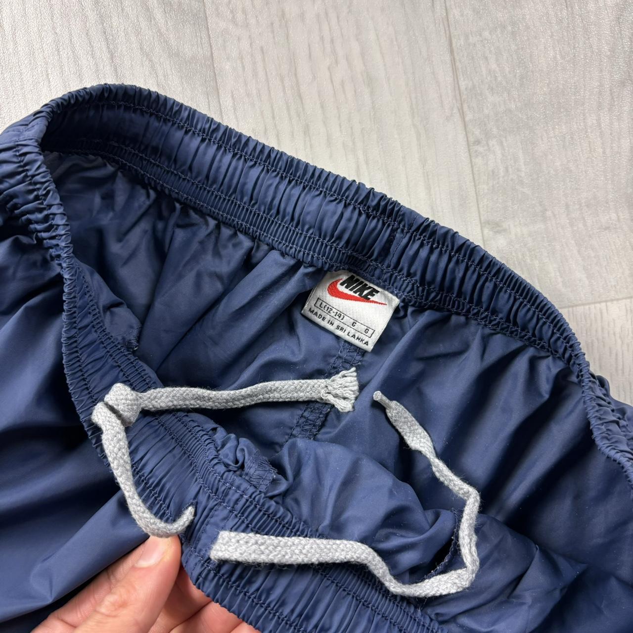 VINTAGE 90s NIKE BAGGY SHELL TRACKSUIT BOTTOMS BLUE
