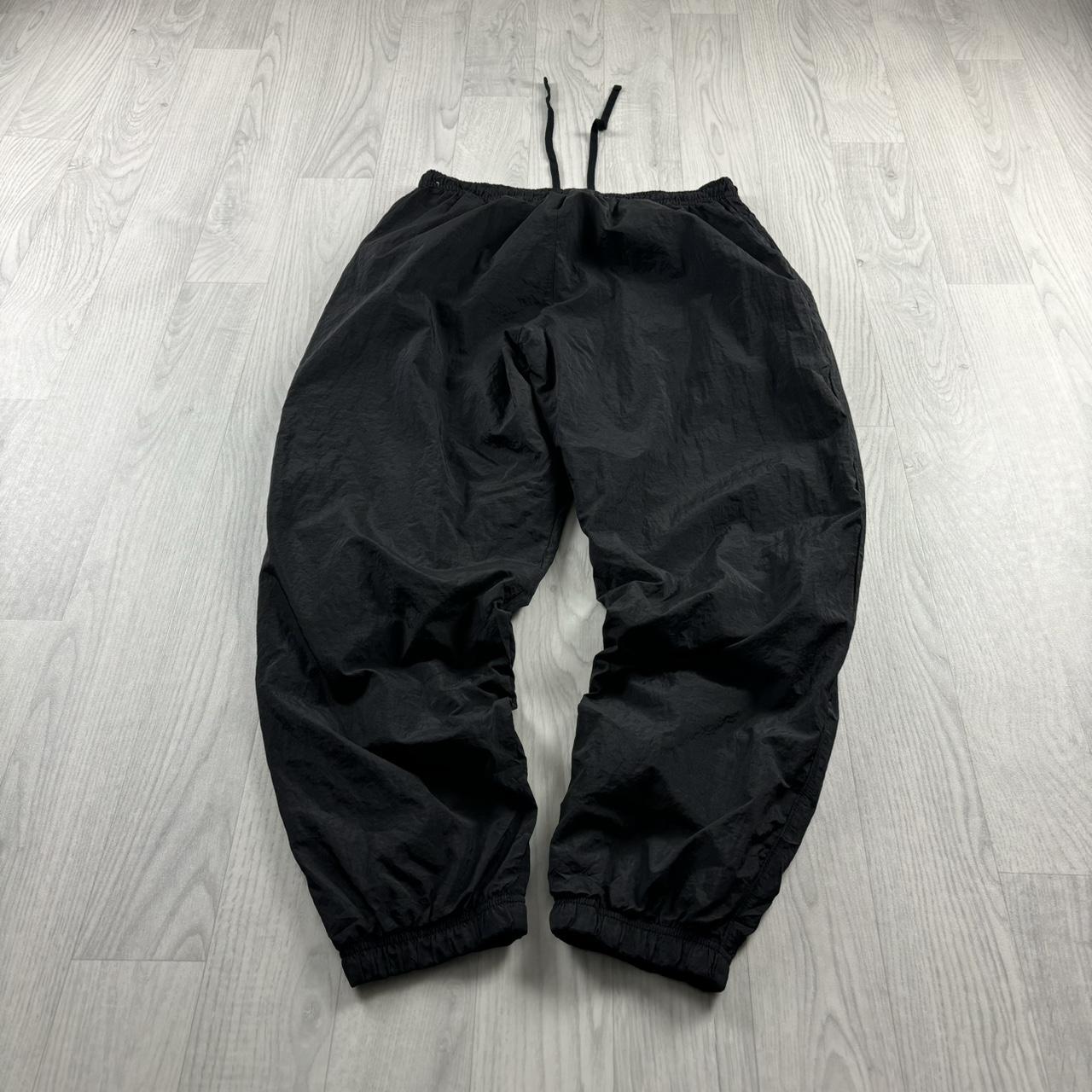 NIKE BAGGY TRACKSUIT BOTTOMS BLACK