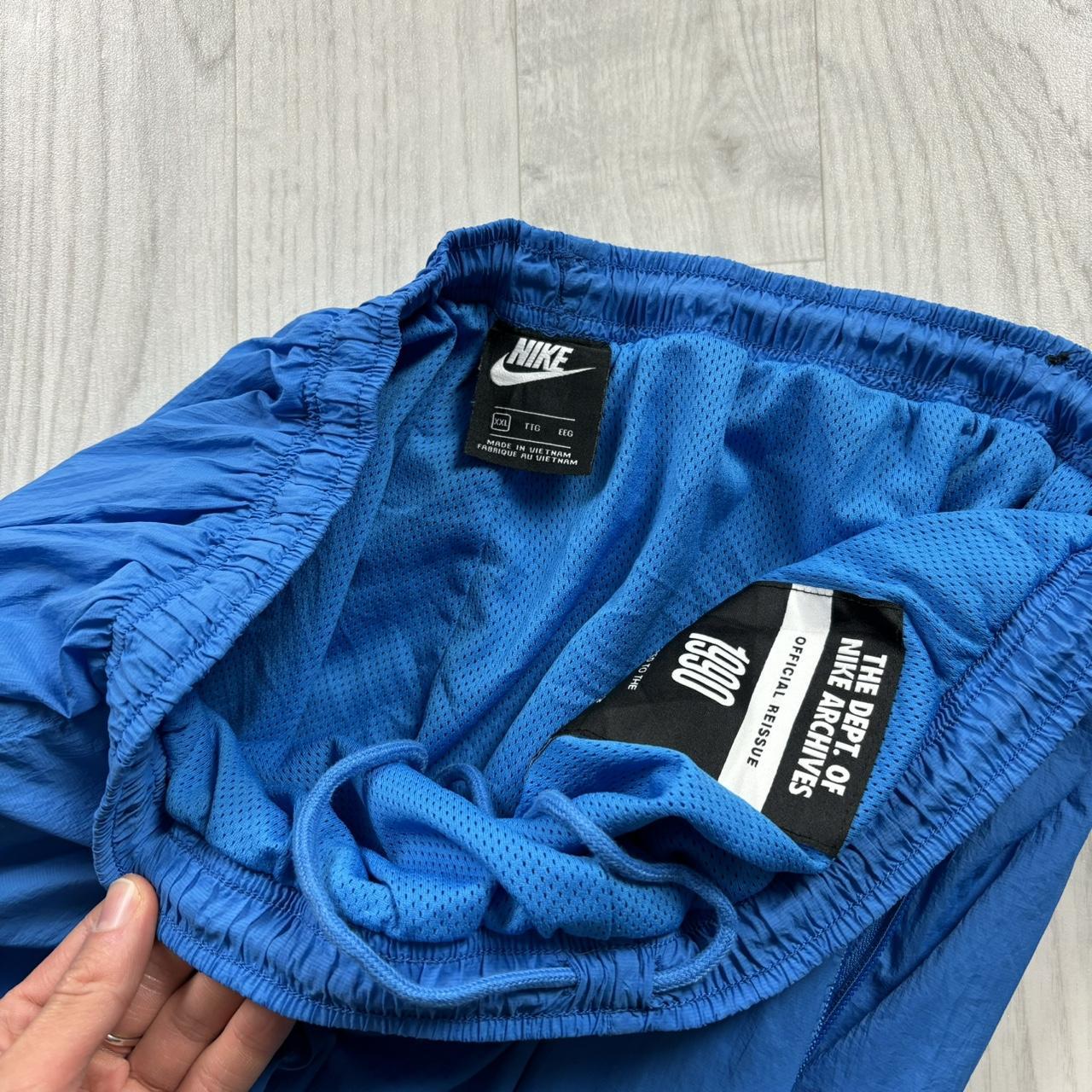 NIKE STRAIGHT LEG BAGGY TRACKSUIT BOTTOMS BLUE