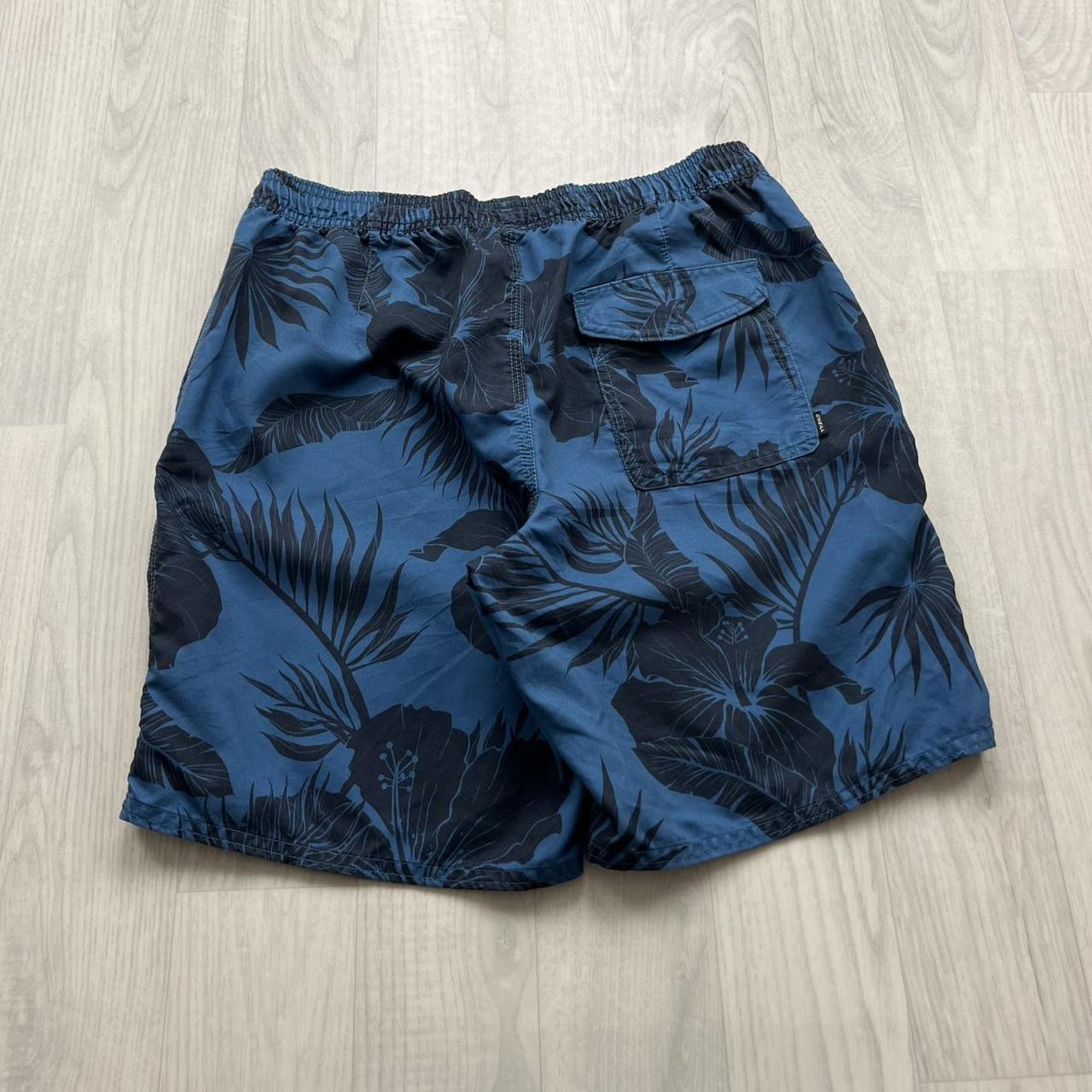 ONEILL FLORAL BAGGY BOARD SWIM SHORTS BLUE