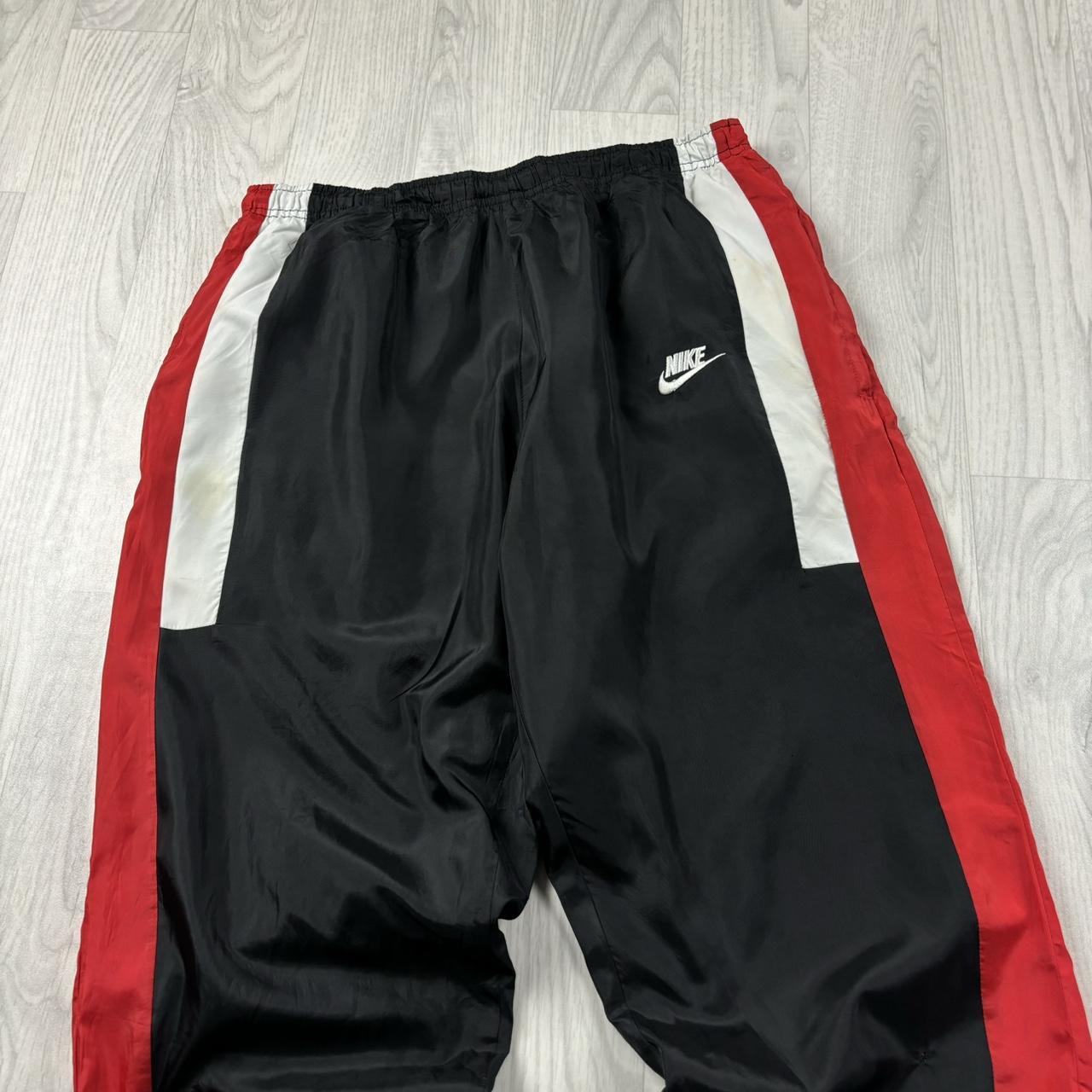 NIKE BAGGY TRACKSUIT BOTTOMS BLACK