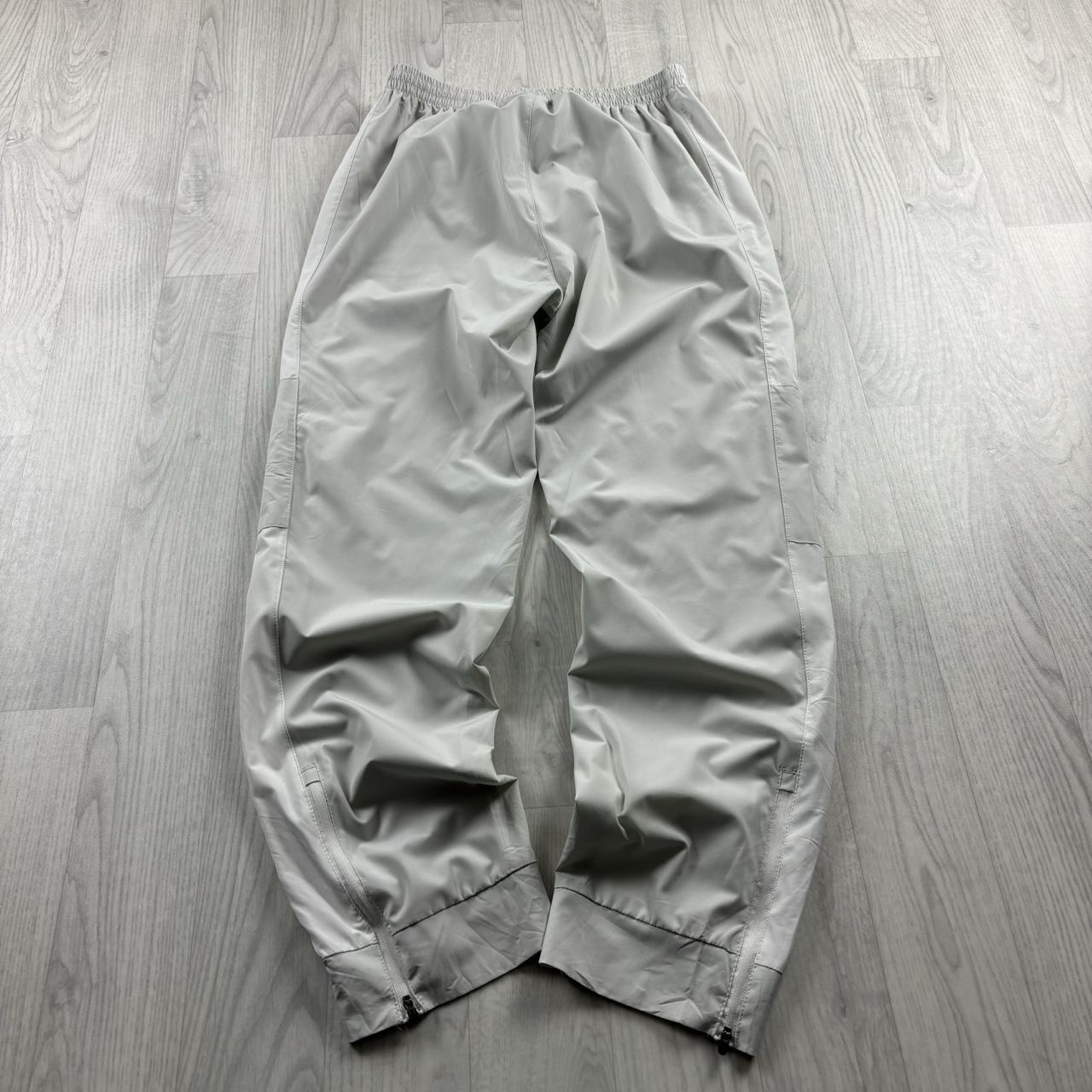 NEW BALANCE BAGGY TRACKSUIT BOTTOMS GREY / WHITE
