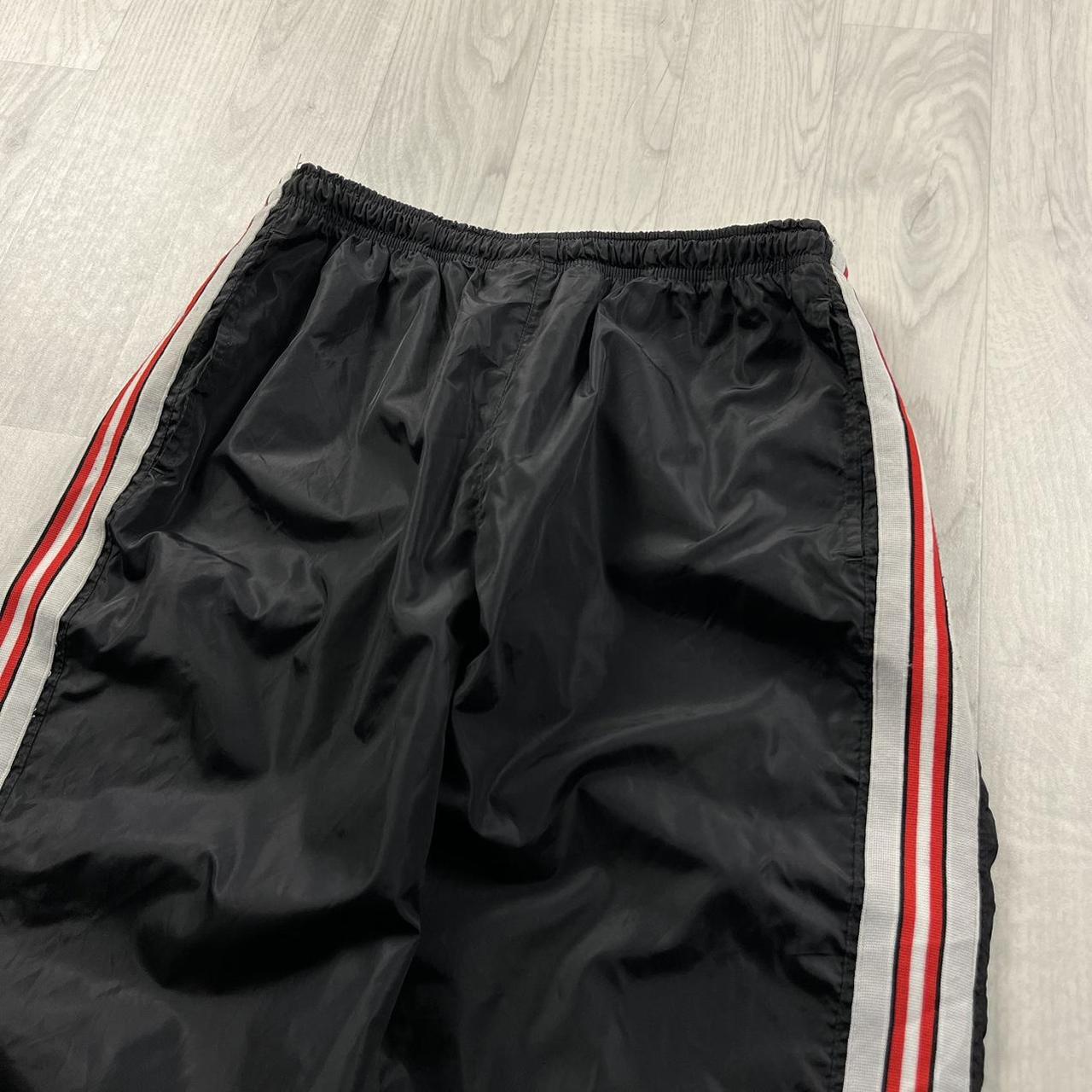 VINTAGE 90s NIKE STRIPE BAGGY TRACKSUIT BOTTOMS BLACK