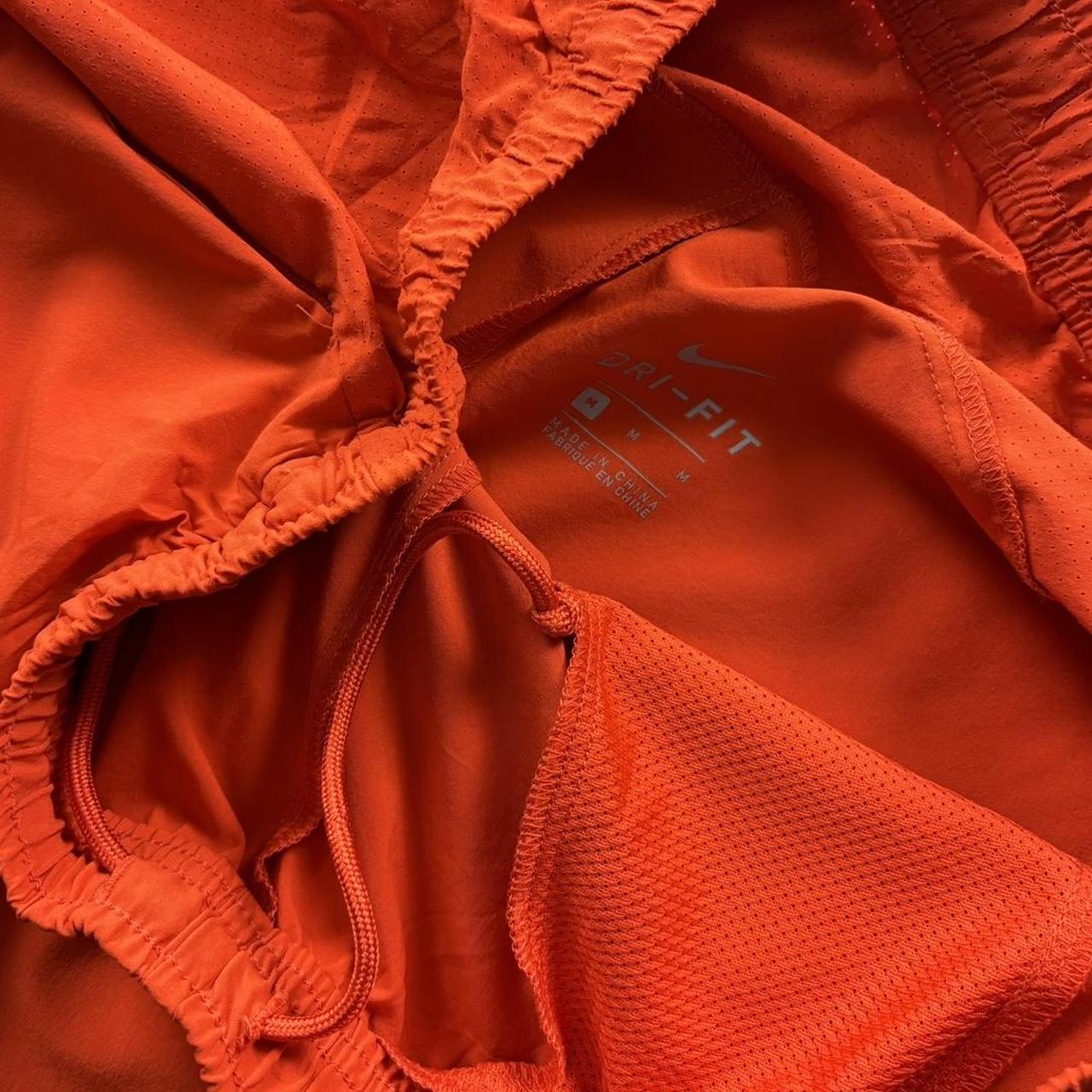 NIKE TEAM BAGGY TRACKSUIT BOTTOMS ORANGE