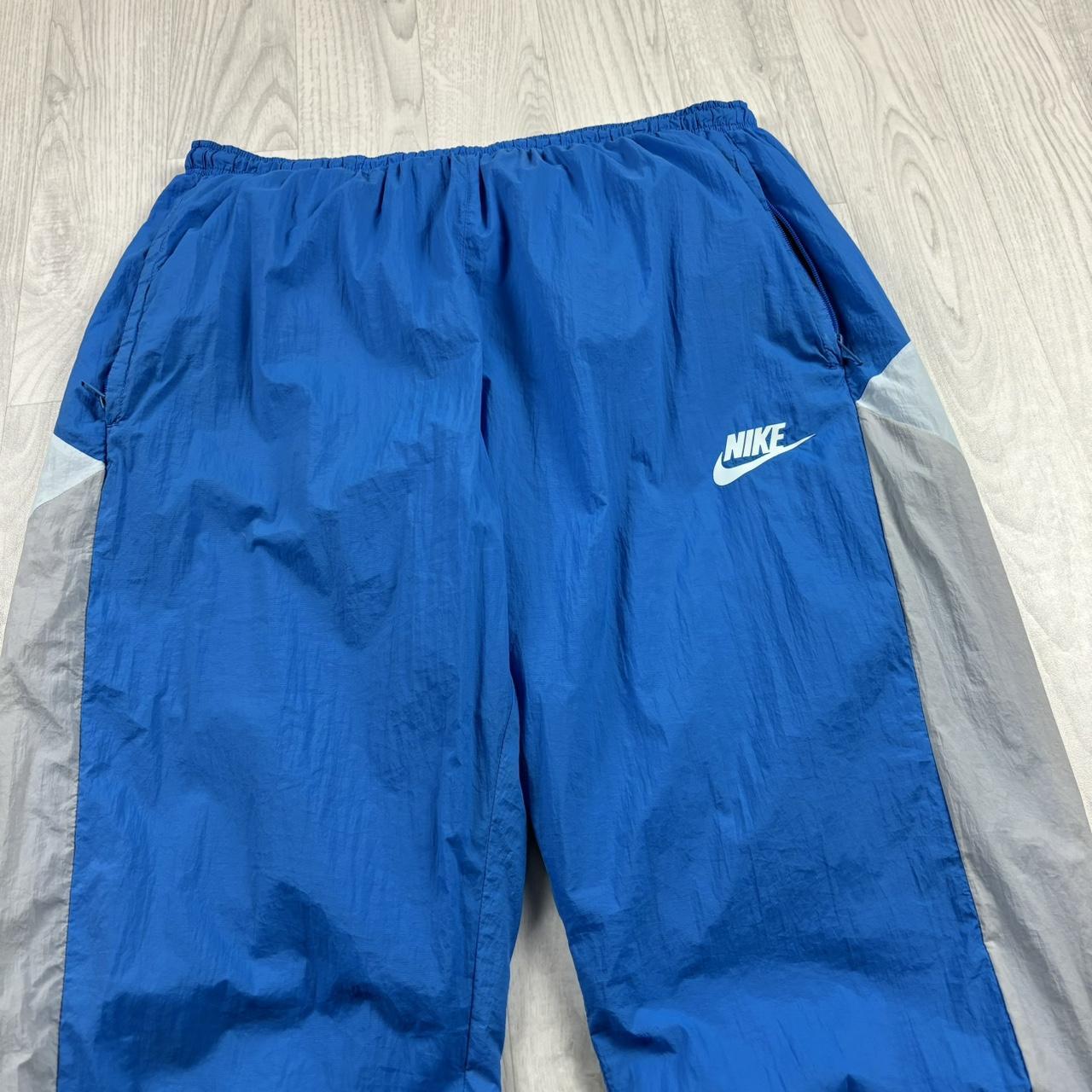 NIKE STRAIGHT LEG BAGGY TRACKSUIT BOTTOMS BLUE