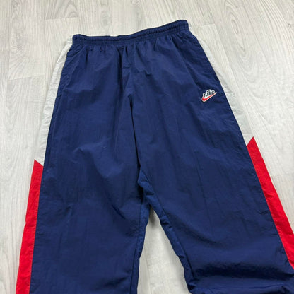 NIKE BAGGY SHELL TRACKSUIT BOTTOMS NAVY BLUE
