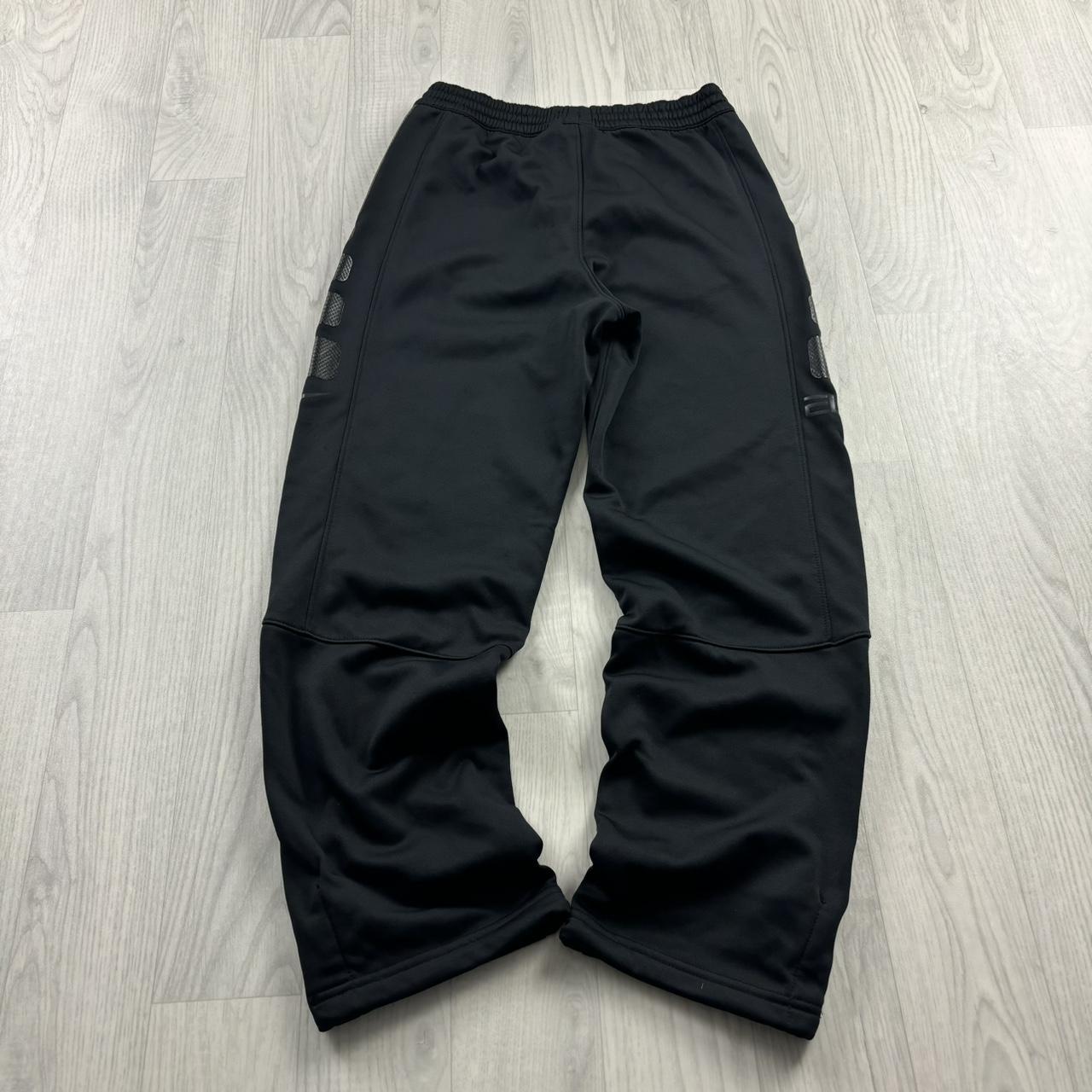 NIKE BAGGY TRACKSUIT BOTTOMS BLACK