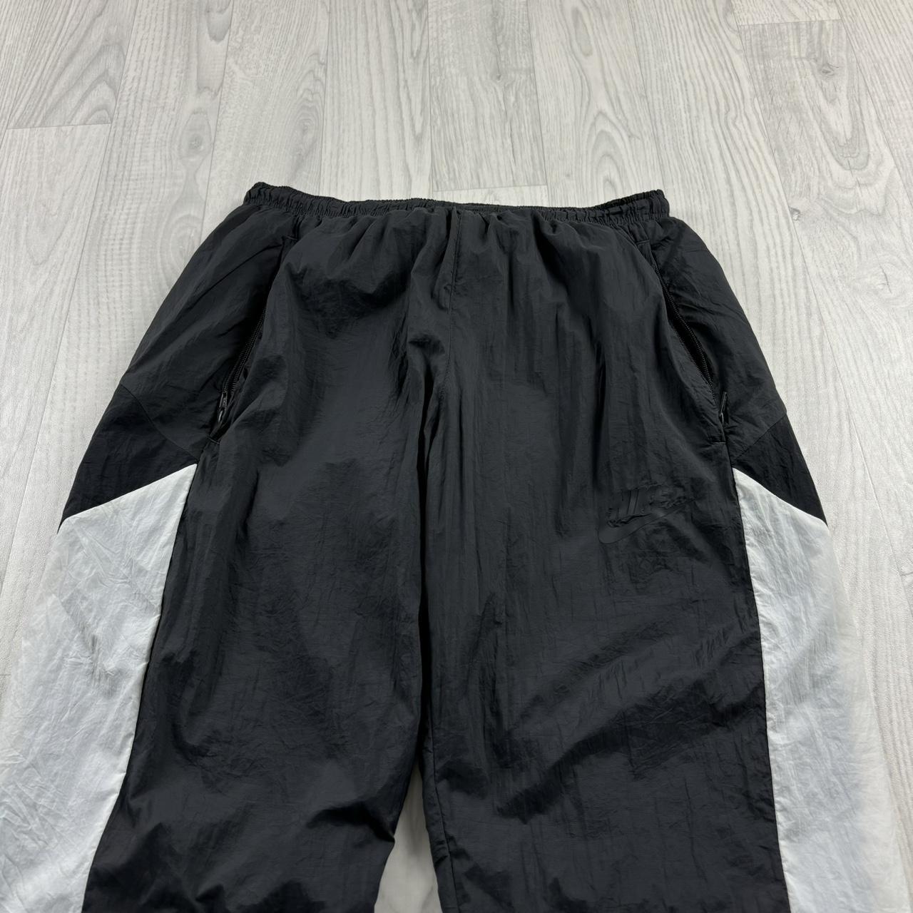 NIKE BAGGY TRACKSUIT BOTTOMS GREY