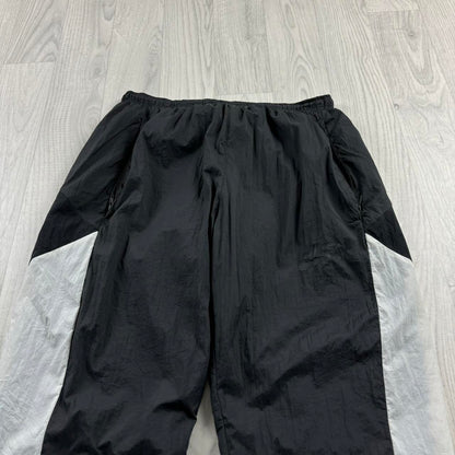 NIKE BAGGY TRACKSUIT BOTTOMS GREY