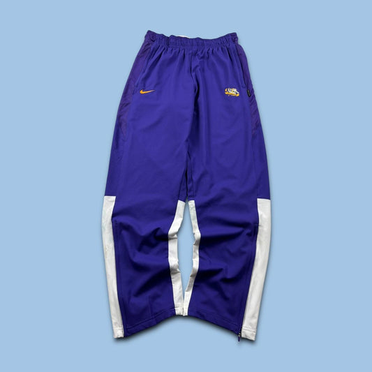 NIKE BAGGY TRACKSUIT BOTTOMS PURPLE