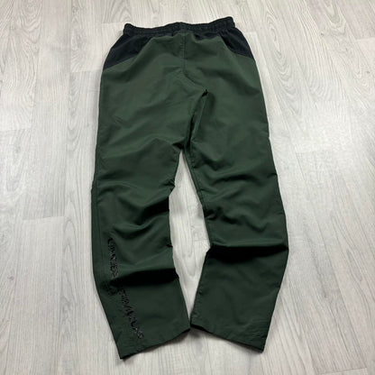 UNDER ARMOUR BAGGY TRACKSUIT BOTTOMS GREEN