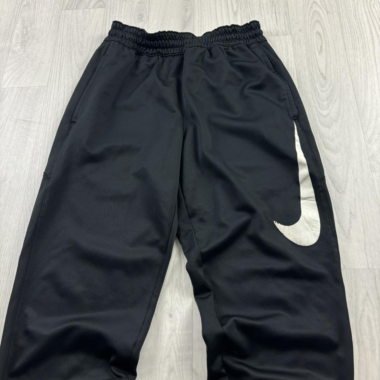 NIKE BAGGY TRACKSUIT BOTTOMS BLACK