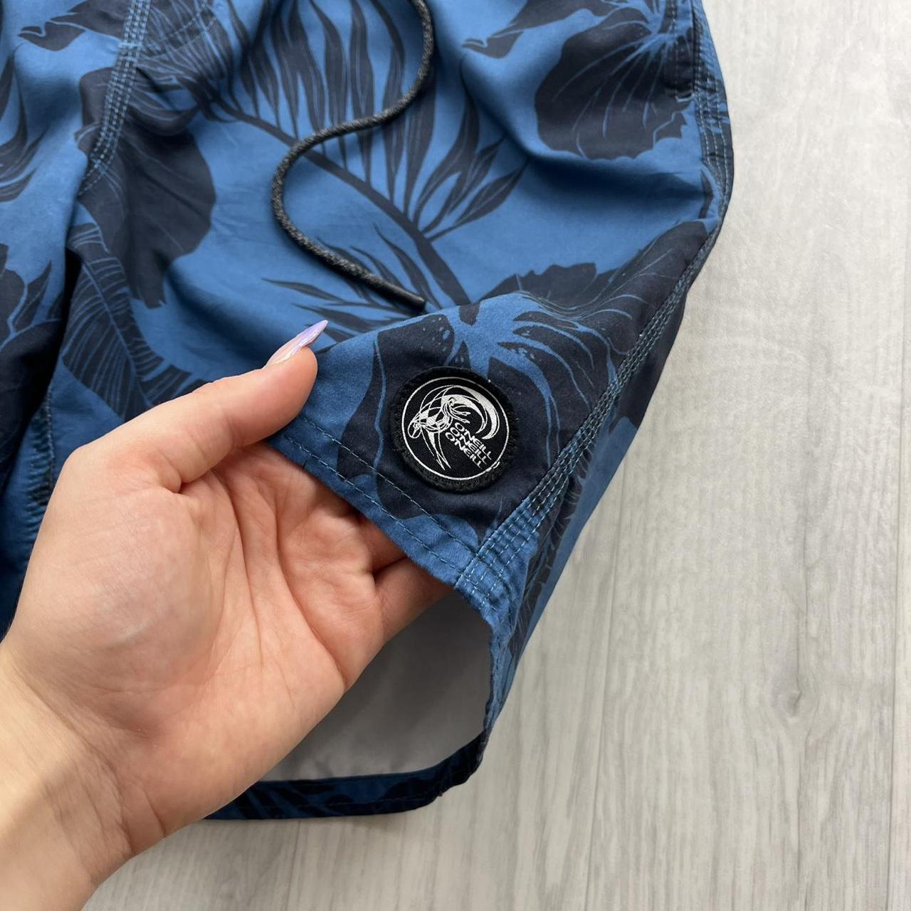 ONEILL FLORAL BAGGY BOARD SWIM SHORTS BLUE