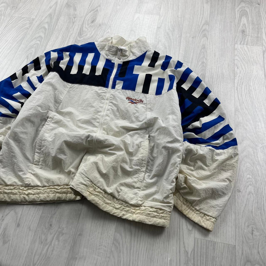 VINTAGE 90s REEBOK LIGHTWEIGHT WINDBREAKER JACKET CREAM / BLUE