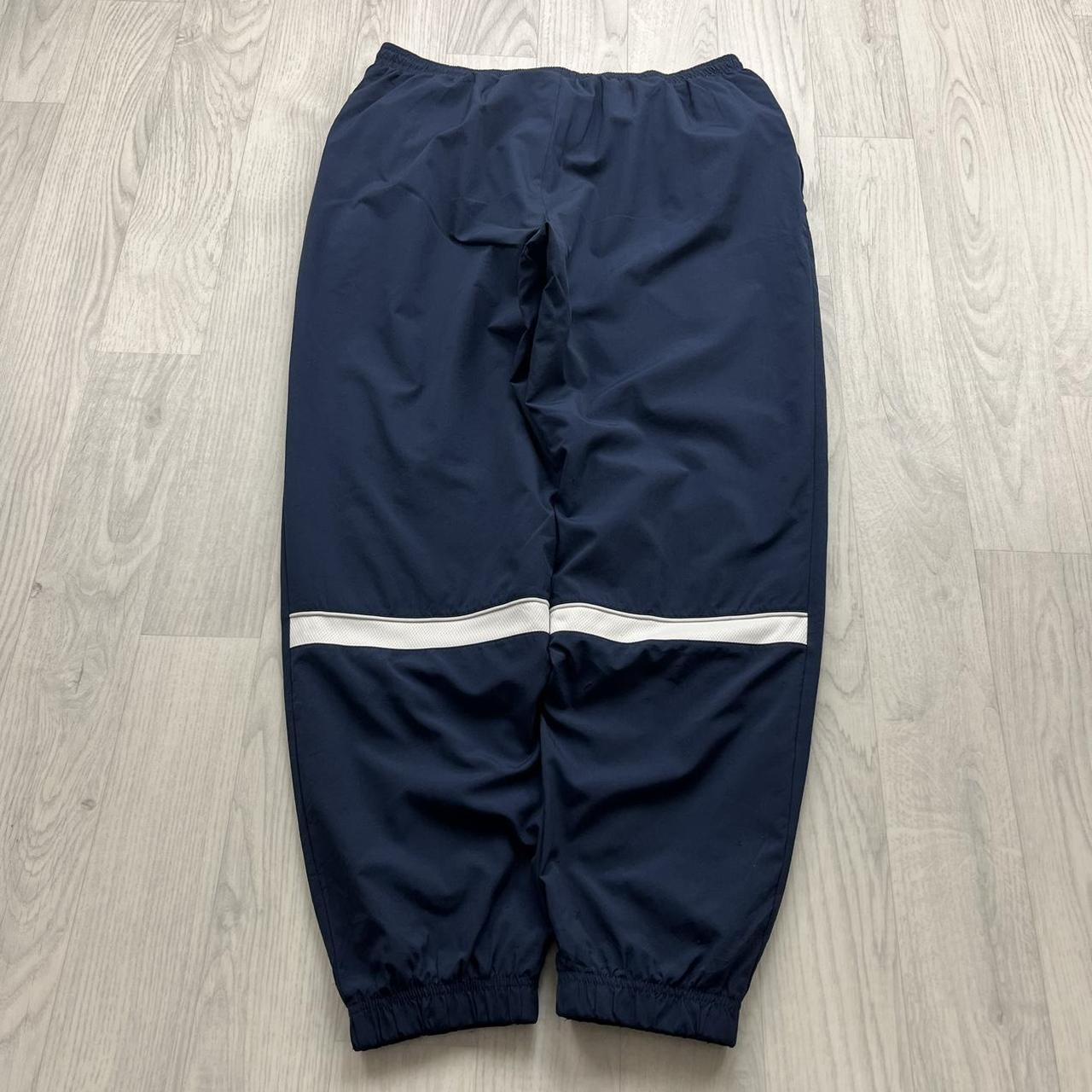 NIKE DRI FIT BAGGY TRACKSUIT BOTTOMS NAVY