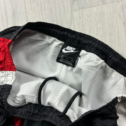 NIKE BAGGY TRACKSUIT BOTTOMS BLACK