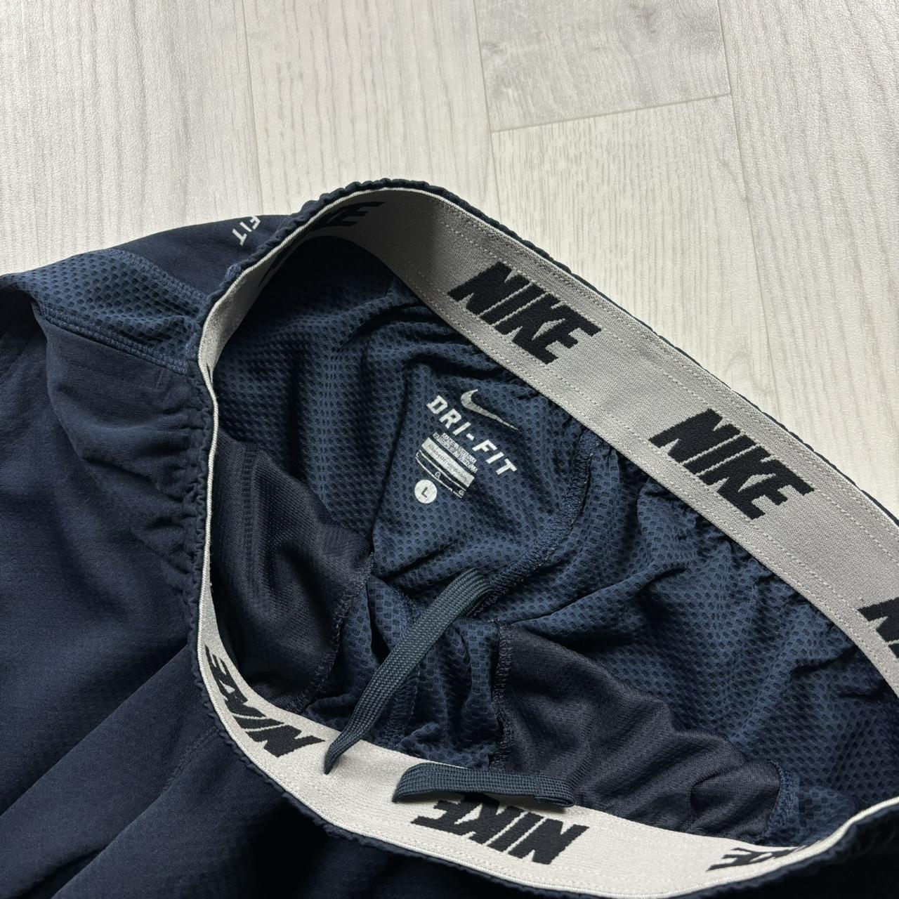 NIKE DRI FIT WIDE LEG BAGGY TRACKSUIT BOTTOMS NAVY