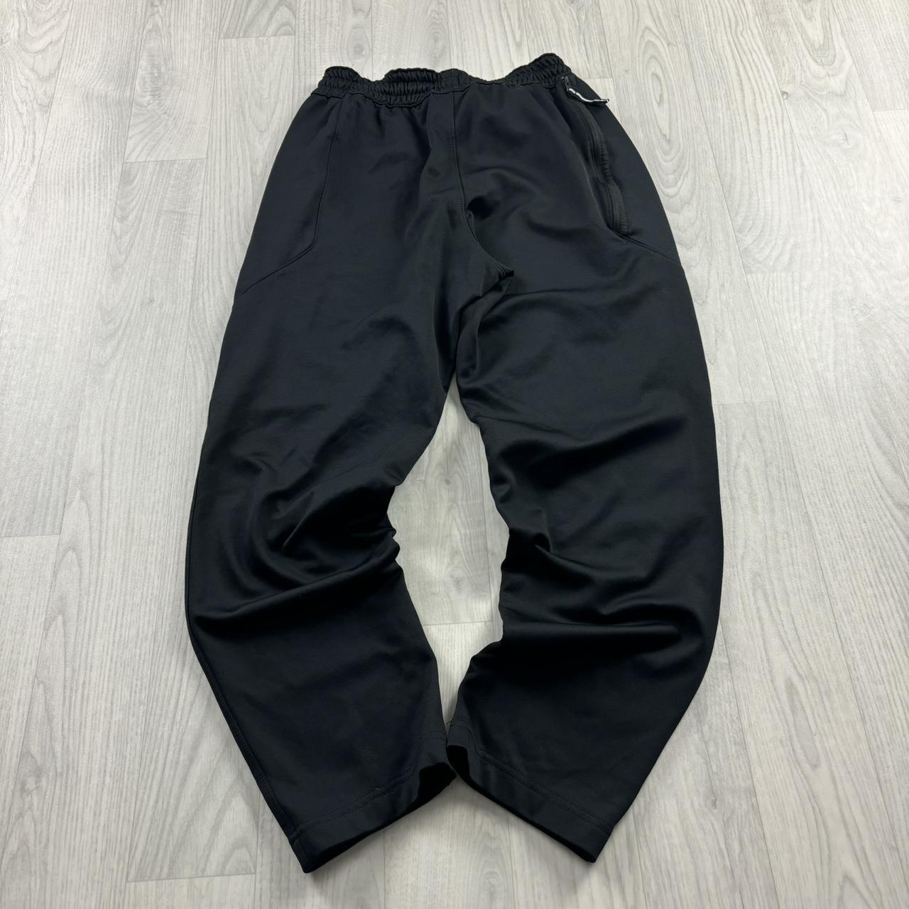 NIKE BAGGY TRACKSUIT BOTTOMS BLACK
