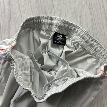 NEW BALANCE BAGGY TRACKSUIT BOTTOMS GREY / WHITE
