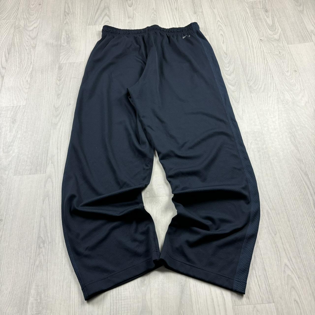 NIKE DRI FIT WIDE LEG BAGGY TRACKSUIT BOTTOMS NAVY