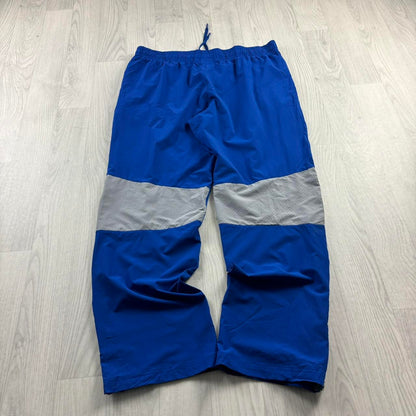 UNDER ARMOUR BAGGY TRACKSUIT BOTTOMS BLUE