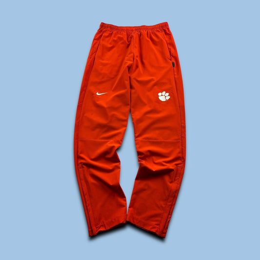 NIKE TEAM BAGGY TRACKSUIT BOTTOMS ORANGE