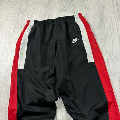 NIKE BAGGY TRACKSUIT BOTTOMS BLACK