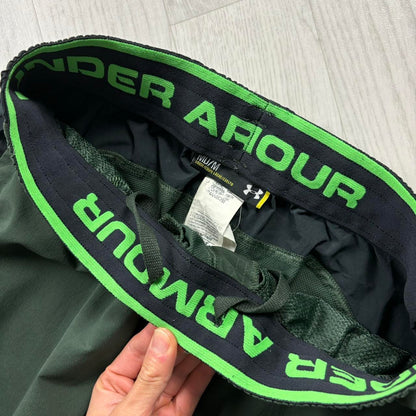 UNDER ARMOUR BAGGY TRACKSUIT BOTTOMS GREEN