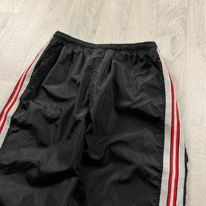 VINTAGE 90s NIKE STRIPE BAGGY TRACKSUIT BOTTOMS BLACK