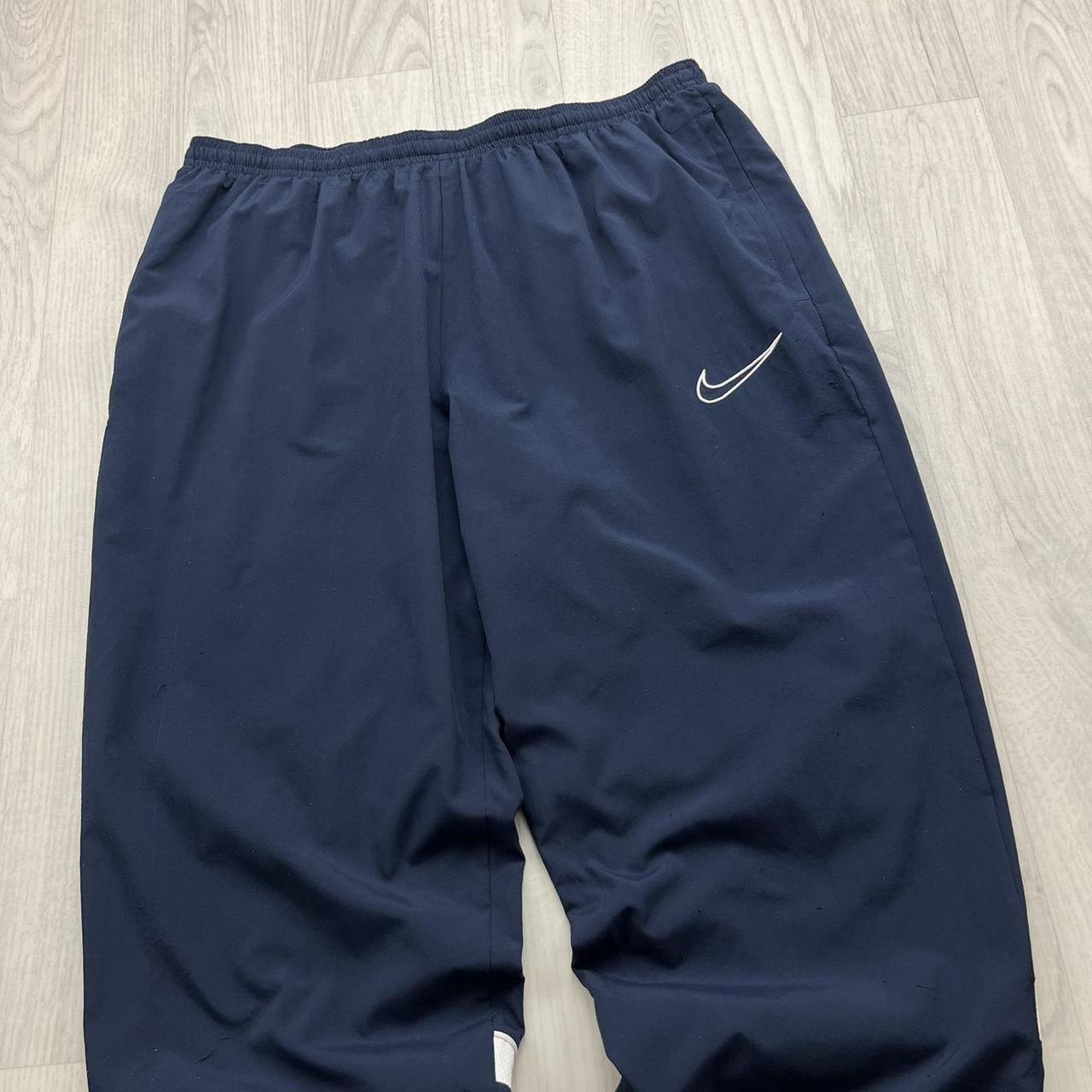 NIKE DRI FIT BAGGY TRACKSUIT BOTTOMS NAVY
