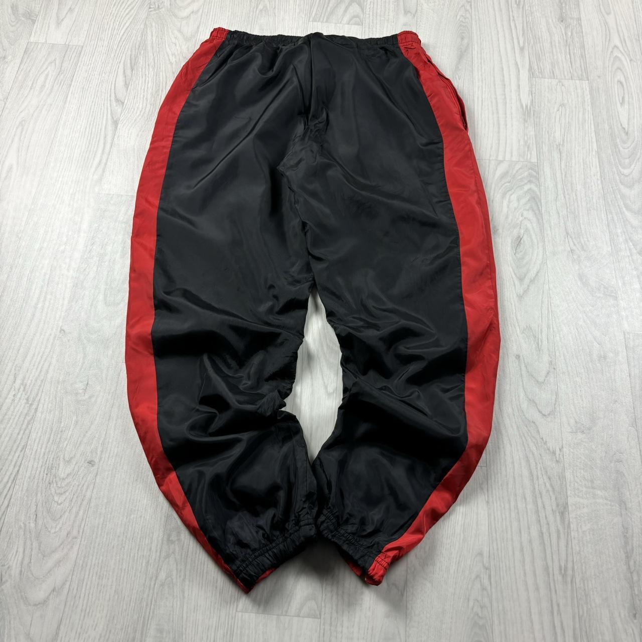 NIKE BAGGY TRACKSUIT BOTTOMS BLACK