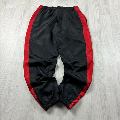 NIKE BAGGY TRACKSUIT BOTTOMS BLACK