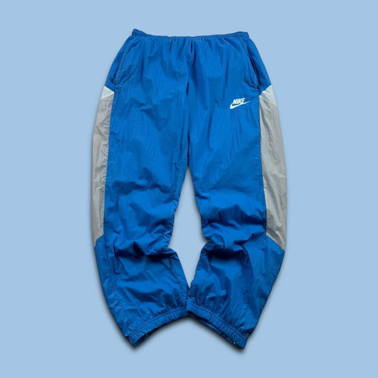 NIKE STRAIGHT LEG BAGGY TRACKSUIT BOTTOMS BLUE